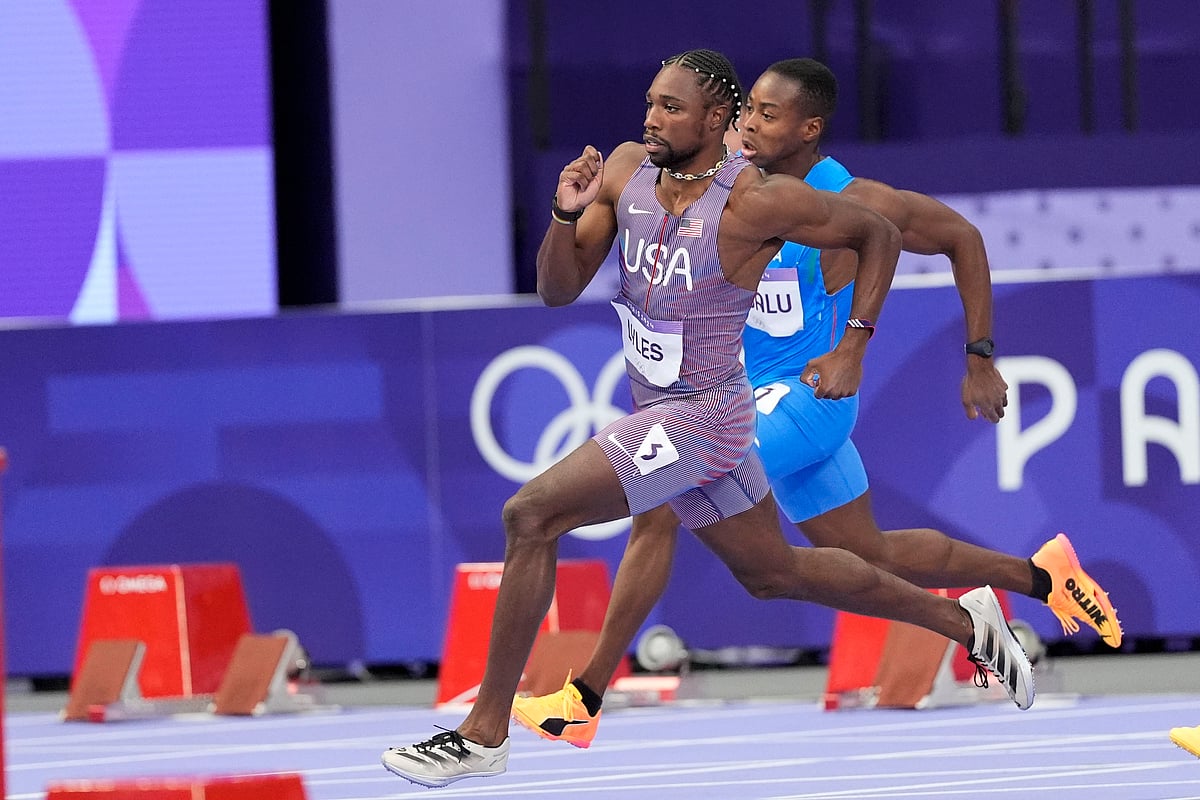 (AP Photo/Matthias Schrader)
 : Noah Lyles, of the United States, competes during the men's 200-meter semifinal at the 2024 Summer Olympics, Wednesday, Aug. 7, 2024, in Saint-Denis, France. 